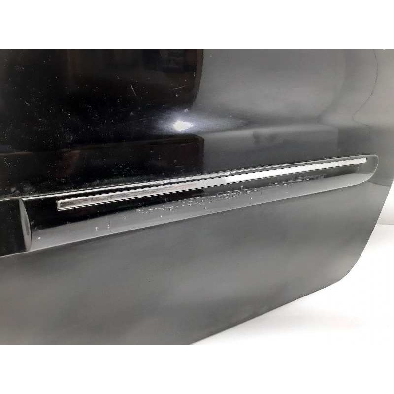 Recambio de puerta trasera izquierda para tata indigo 1.4i sw referencia OEM IAM  COLOR NEGRO 