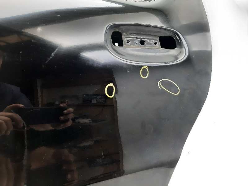 Recambio de puerta trasera izquierda para tata indigo 1.4i sw referencia OEM IAM  COLOR NEGRO 